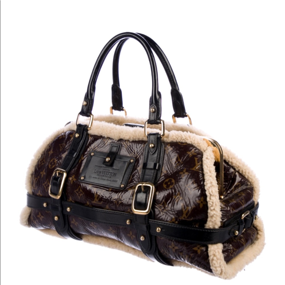 Louis Vuitton Shearling storm bag.
